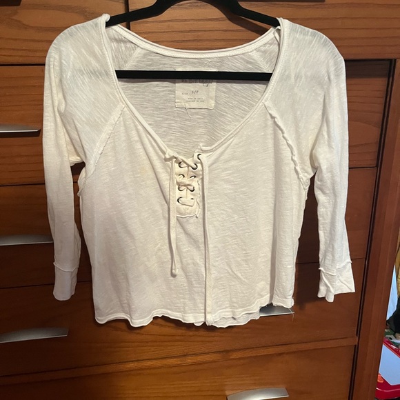 Brand: Free people Size: Small Style: White lace up top with quarter sleeves - Picture 4 of 4